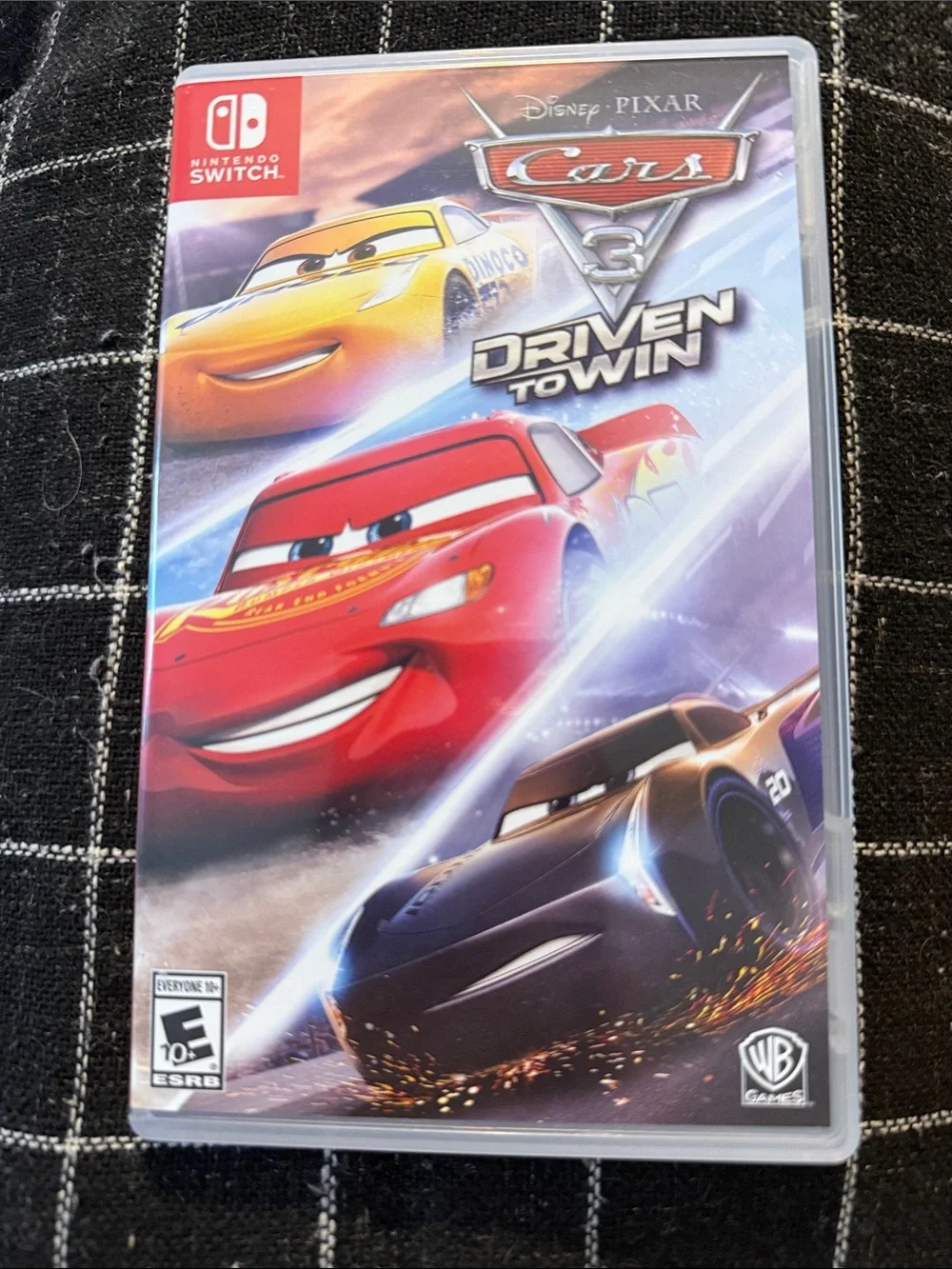 Nintendo Switch Cars 3: Driven to Win - Red, Yellow, Blue, Black Cover